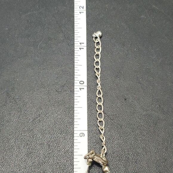 Silver tone black flower floating necklace - Picture 10 of 11